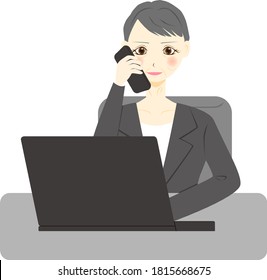 Middle aged woman  with Laptop Computer. Talking to Someone on Phone.