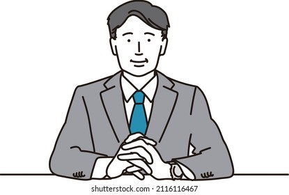 Middle-aged Asian businessman interviewing with a smile