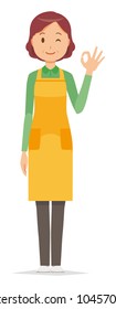 A middle-aged housewife wearing an apron is giving an okay sign