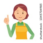 A middle-aged housewife wearing an apron is showing thumbs up