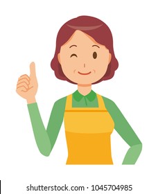 A middle-aged housewife wearing an apron is showing thumbs up
