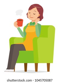 A middle-aged housewife wearing an apron is sitting on a sofa and drinking coffee