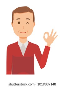A middle-aged man wearing a sweater is playing an okay sign