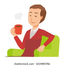 A middle-aged man wearing a sweater is sitting on a sofa and drinking coffee