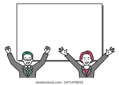 Middle-aged man and woman in suits raising their hands in front of a whiteboard