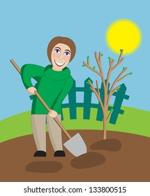 Middle-aged woman digs in the spring garden