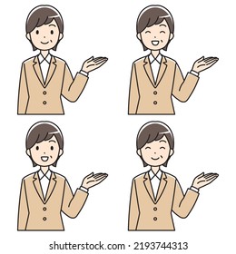 A middle-aged woman in a suit who guides with a smile