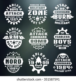 Military badges. Graphic design for t-shirt. White print on blurred background