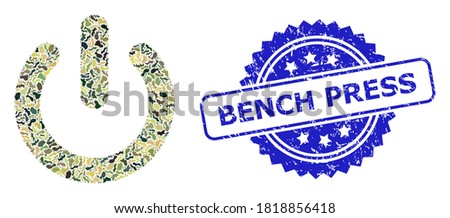 Military camouflage combination of turn off, and Bench Press rubber rosette seal print. Blue seal includes Bench Press tag inside rosette. Mosaic turn off constructed with camouflage spots.