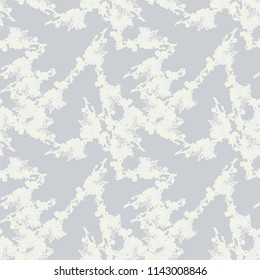 Military camouflage seamless pattern in beige or light yellow and different shades of grey color. Seamless repeat UFO camouflage pattern, usable as winter camoflauge urban print, background etc