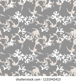 Military camouflage seamless pattern in different shades of grey and beige colors. Seamless repeat uban camouflage pattern, usable as winter camoflauge print, bright backdrop, background etc.