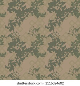 Military camouflage seamless pattern in green, khaki, olive and brown colors. Rhombic grid camo repeat background. Usable as camoflauge textile print, backdrop, wallpaper etc.