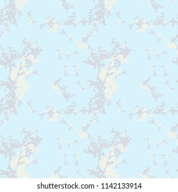 Military camouflage seamless pattern in light blue, yellow and different shades of grey color. Seamless repeat UFO camouflage pattern, usable as winter camoflauge urban print, bright background etc