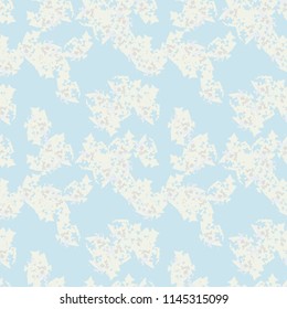 Military camouflage seamless pattern in light blue and different shades of grey or beige colors. Seamless repeat UFO camouflage pattern, usable as winter camoflauge urban print, bright background etc