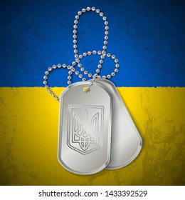 Military dog tag with national symbols of Ukraine on dirty flag. Ukraine conflict.