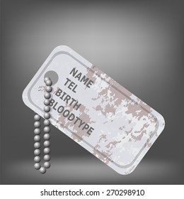 Military Dog Tag on Grey Background. Silver Identity Tag.