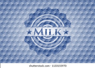 Milk blue badge with geometric pattern background.