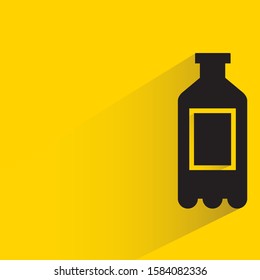 milk bottle with drop shadow yellow background