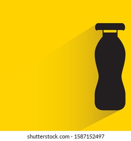 milk bottle with drop shadow in yellow background