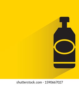 milk bottle with drop shadow in yellow background