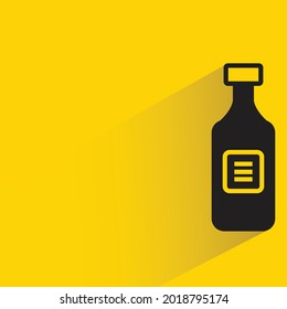 milk bottle with shadow on yellow background