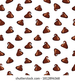 Milk chocolate chips isolated on white background.Milk chocolate chip background.