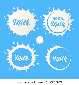 Milk and cream blots set. White smudges splashes drops on blue background. Milk hand written lettering. Milk logo. Vector illustration.