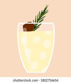 milk creamy drink with ice cubes inside and chocolate and rosemary decor. winter drinks.