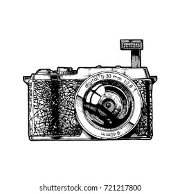 MILK. Mirrorless interchangeable lens camera with raised Pop-Up flashe. Vector hand drawn sketch of photocamera in vintage engraved style on white background.