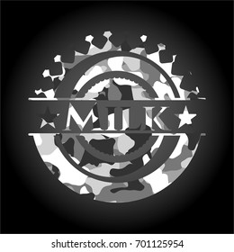 Milk on grey camo texture
