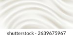 Milk or silk cream texture with smooth flowing waves - white liquid surface with elegant folds and soft ripples. Luxurious dairy product background for cosmetic or food design presentations.
