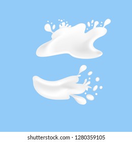 Milk splashes. Realistic milky splashes and drops of dairy drink or yogurt isolated on blue background. EPS10 vector