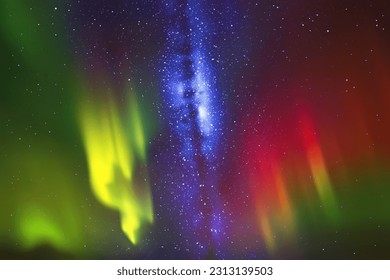 Milky Way and Northern lights. Red green aurora. Night starry sky
