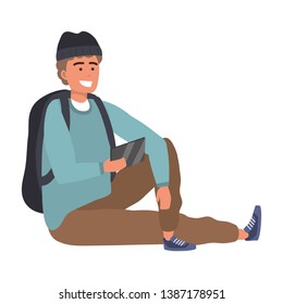 Millennial student sitting browsing on smartphone isolated