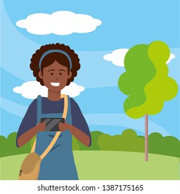 Millennial student using smartphone outdoors