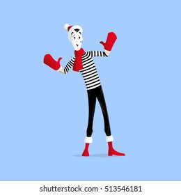 Mime performing a pantomime called behind the wall in the winter