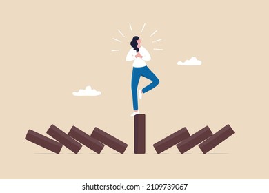 Mindfulness meditation relax to reduce stress and eliminate distraction, calm to build energy or spiritual wellness concept, success woman relax and meditating with yoga pose on standing domino.