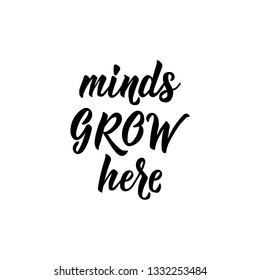 Minds grow here. Lettering. Ink illustration. Modern brush calligraphy. Isolated on white background