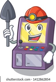 Miner arcade machine next to mascot table