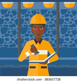Miner checking documents.