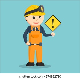 miner holding warning sign