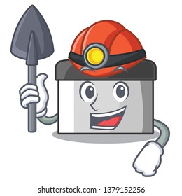 Miner pastry scraper on wooden mascot table