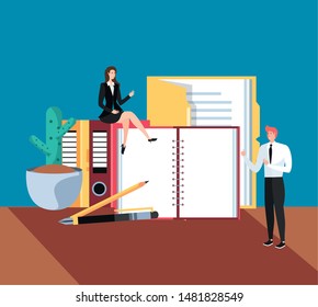 mini business couple with books in the workplace