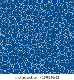 Mini circle seamless pattern. Geometric surface print. Repeated irregular polka dot, bubble motif ornament. Geo dotted ornamental background. Modern minimal design texture. Vector abstract wallpaper