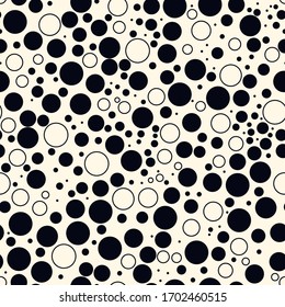 Mini circle seamless pattern. Geometric surface print. Repeated irregular polka dot, bubble motif ornament. Geo dotted ornamental background. Modern minimal design texture. Vector abstract wallpaper
