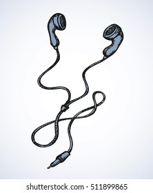 Mini fashionable modern personal plastic ear bud headphones for mp3 player or phone. Freehand outline ink drawn background sketchy in art scribble style pen on paper. View close-up with space for text