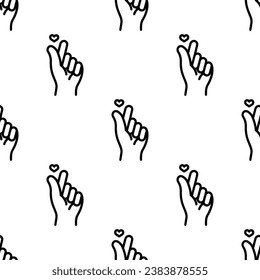 Mini Heart Hand Gesture seamless pattern background.