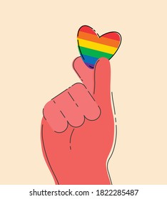 Mini heart hand gesture vector. Flat retro color hand holding a small heart in rainbow, pride flag color.