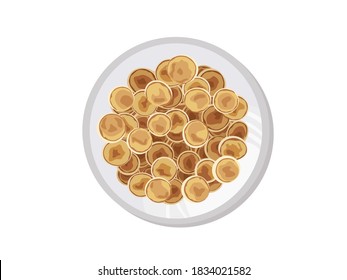 Mini pancake flakes cereal with butter and honey for breakfast on the table. Tiny pancakes, a new food trend. A cute healthy breakfast or snack. Recipe, menu. View from above