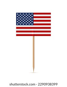 Miniature rectangle paper American flag on wooden stick or toothpick. Decoration for cupcake or other food. 4th of July, Independence or Presidents Day of USA, United States of America.